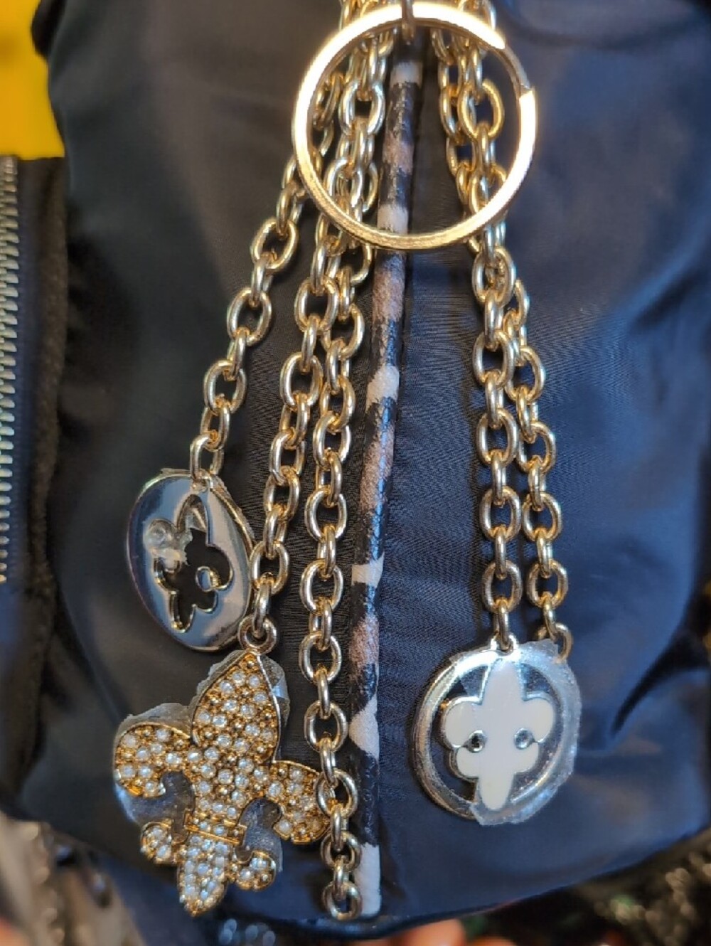 Kathy Van Zeeland Fleur-de-lis Bag/Keychain with Gold Chain Tassel Charms